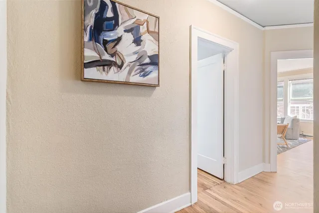 a view of a hallway with a white walls