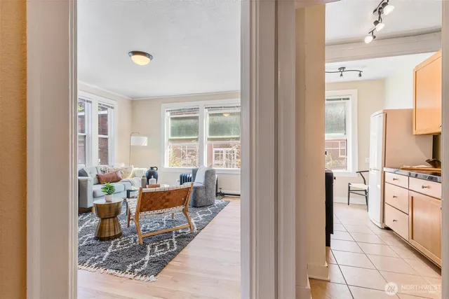 a living room with furniture and a table