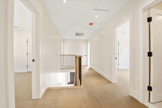 an empty room with windows and yard