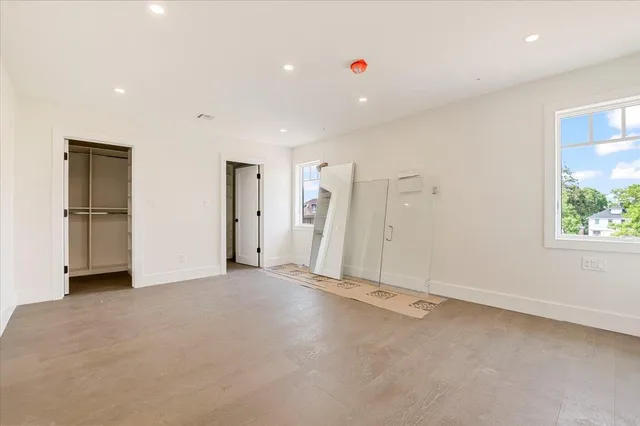 a bathroom with a sink a mirror and a bathtub