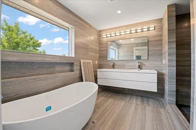 a close view of a sink and a washer and dryer