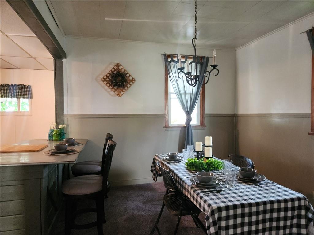 129 Franklin Avenue Vandergrift, PA 15690 - Photo 3 of 8 a view of a dining room with furniture and window