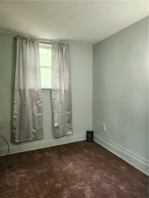 129 Franklin Avenue Vandergrift, PA 15690 - Photo 8 of 8 an empty room with windows