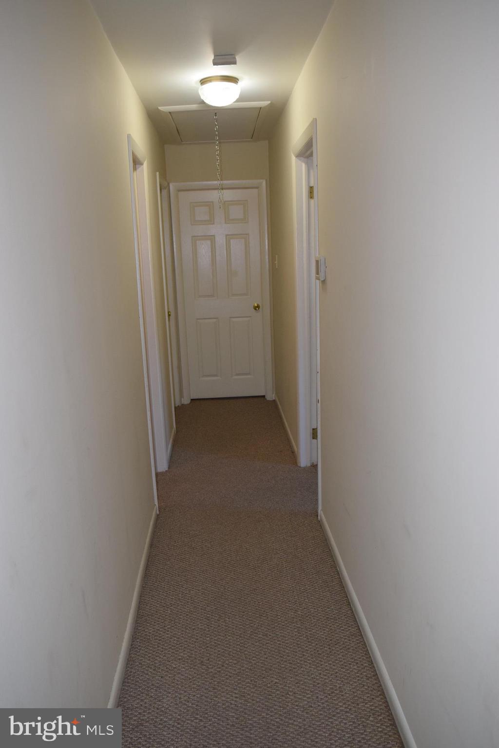 402 Tuckahoe Road Marmora, NJ 08223 - Photo 15 of 28 View down the hallway from the Living Room