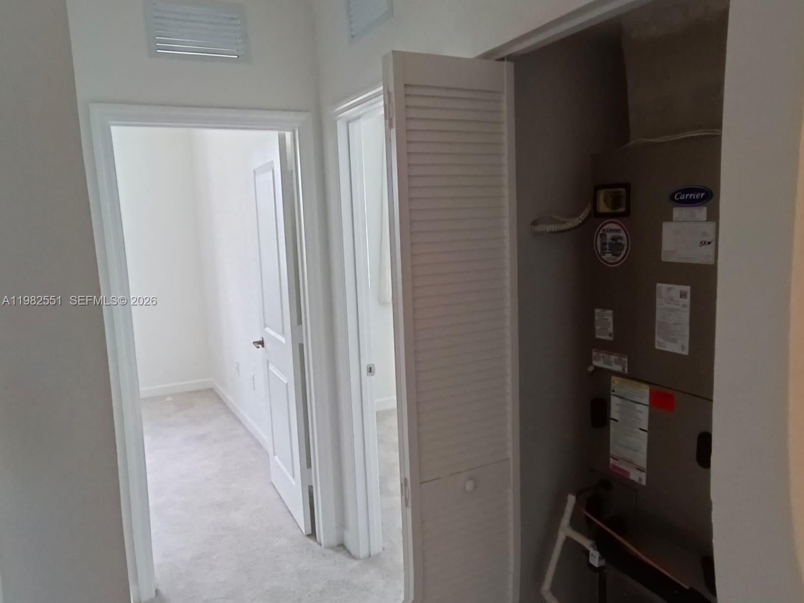 13262 Southwest 285th Street Homestead, FL 33033 - Photo 13 of 16 a view of hallway