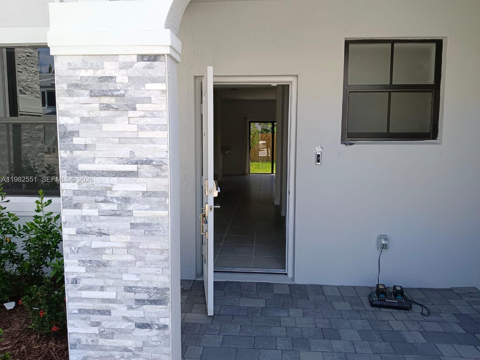 13262 Southwest 285th Street Homestead, FL 33033 - Photo 2 of 16 a view of an entryway