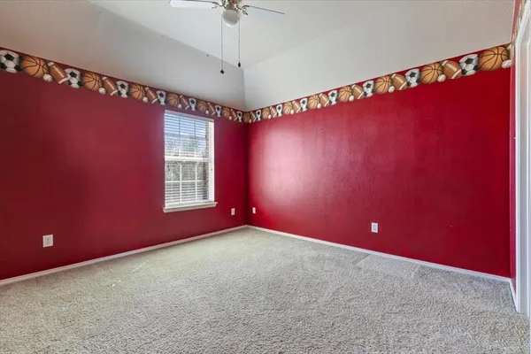 a bathroom with a sink a toilet and shower curtain