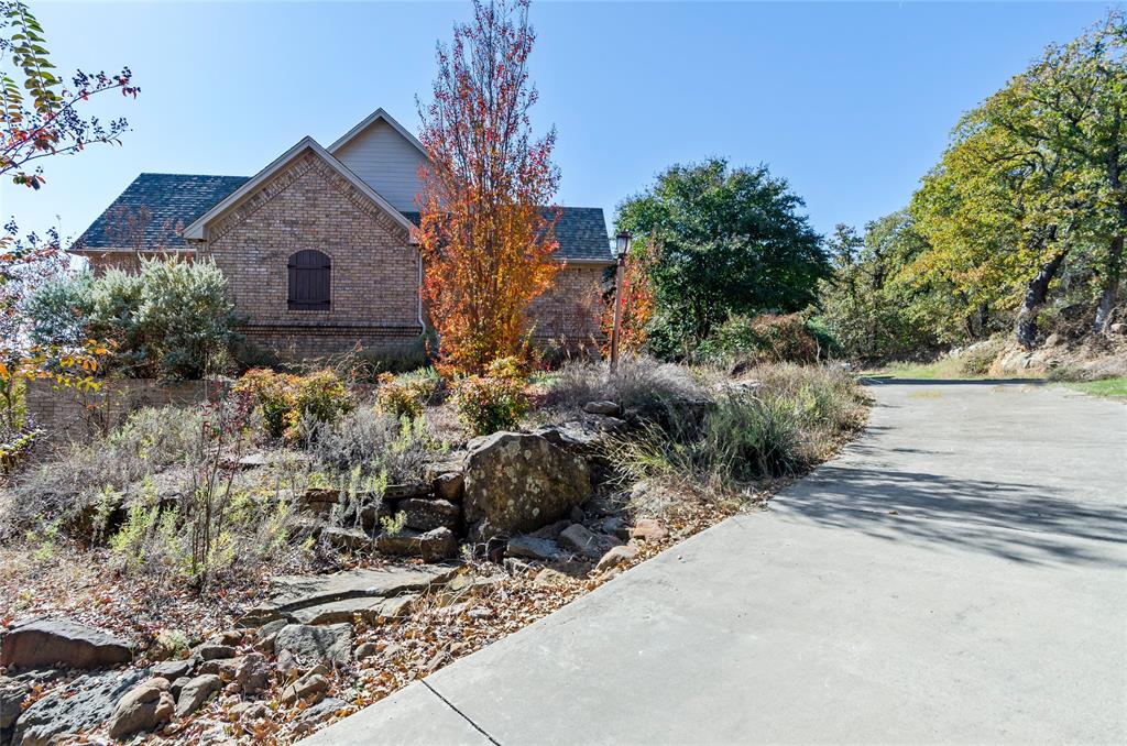 396 Ranchview Court Bowie, TX 76230 - Photo 24 of 38 a view of a house with a yard