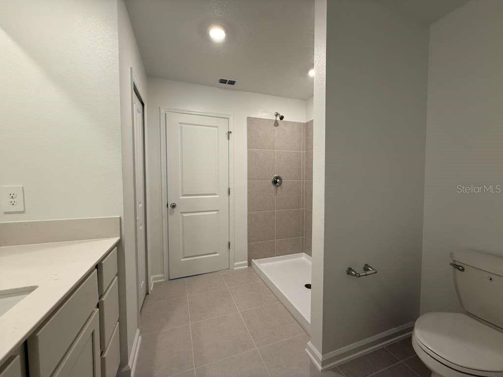 2728 Lookout Rdg Road Haines City, FL 33844 - Photo 13 of 21 a bathroom with a sink a toilet and shower