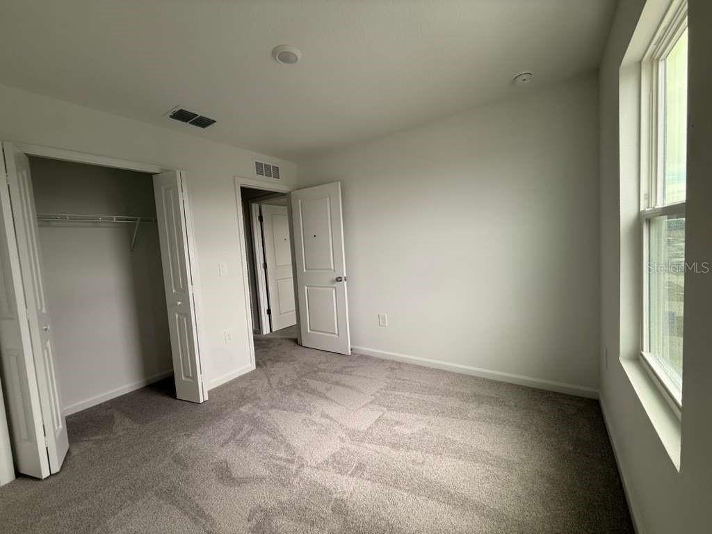 2728 Lookout Rdg Road Haines City, FL 33844 - Photo 19 of 21 an empty room with windows