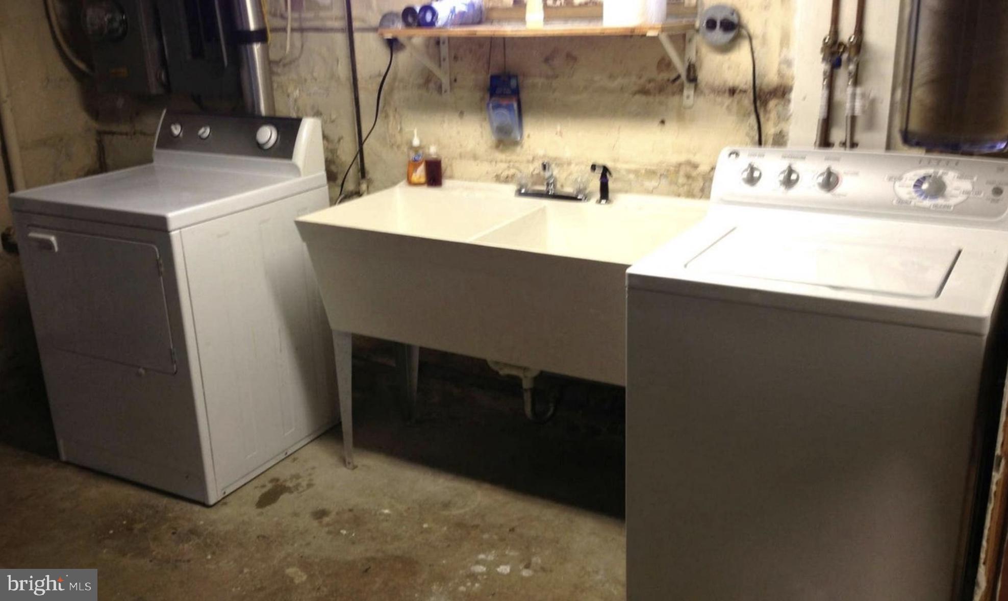 5001 Overton Street Baltimore, MD 21229 - Photo 20 of 21 a bathroom with a sink and a mirror
