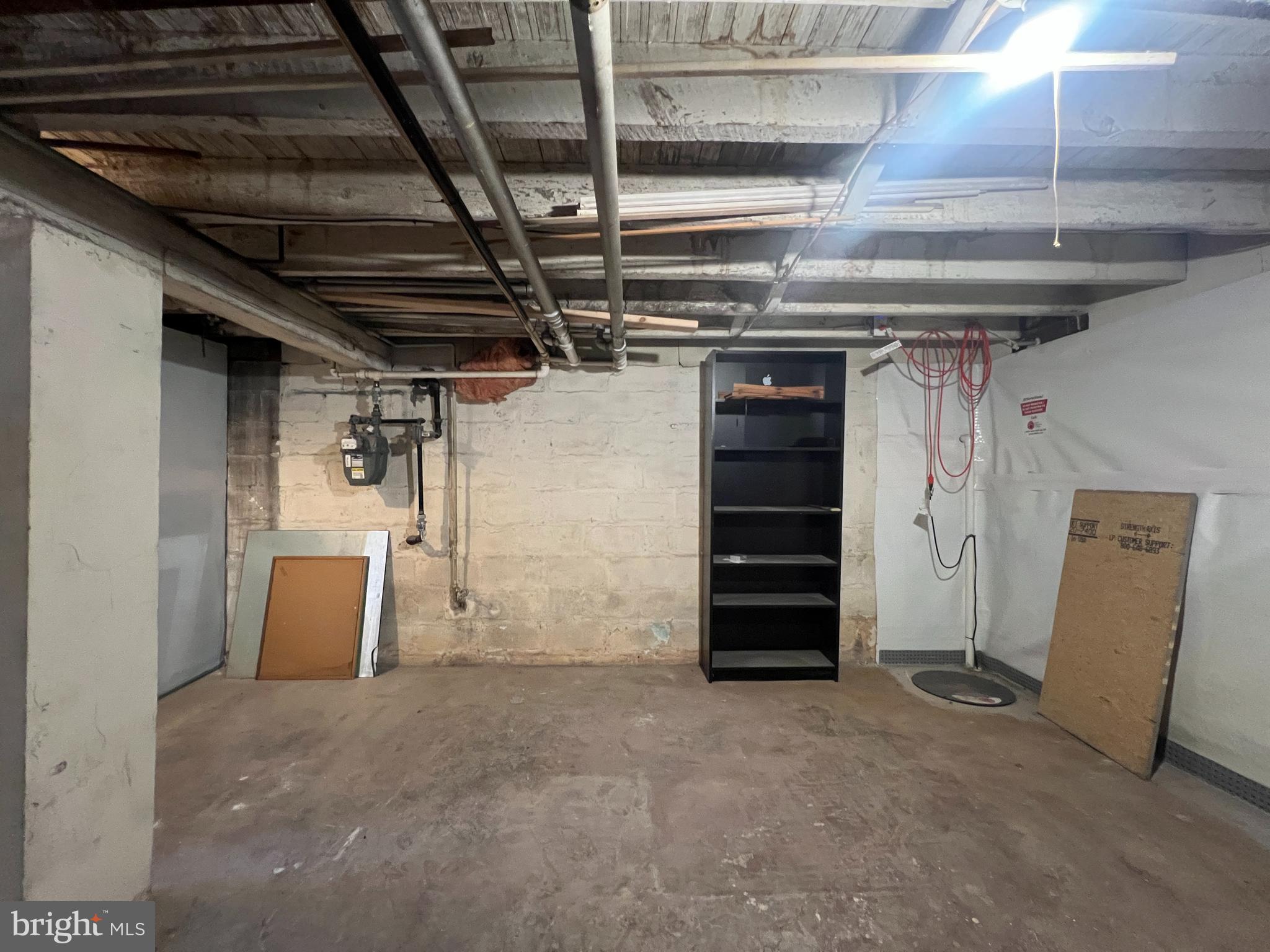 5001 Overton Street Baltimore, MD 21229 - Photo 24 of 32 a view of an empty room with furniture and storage
