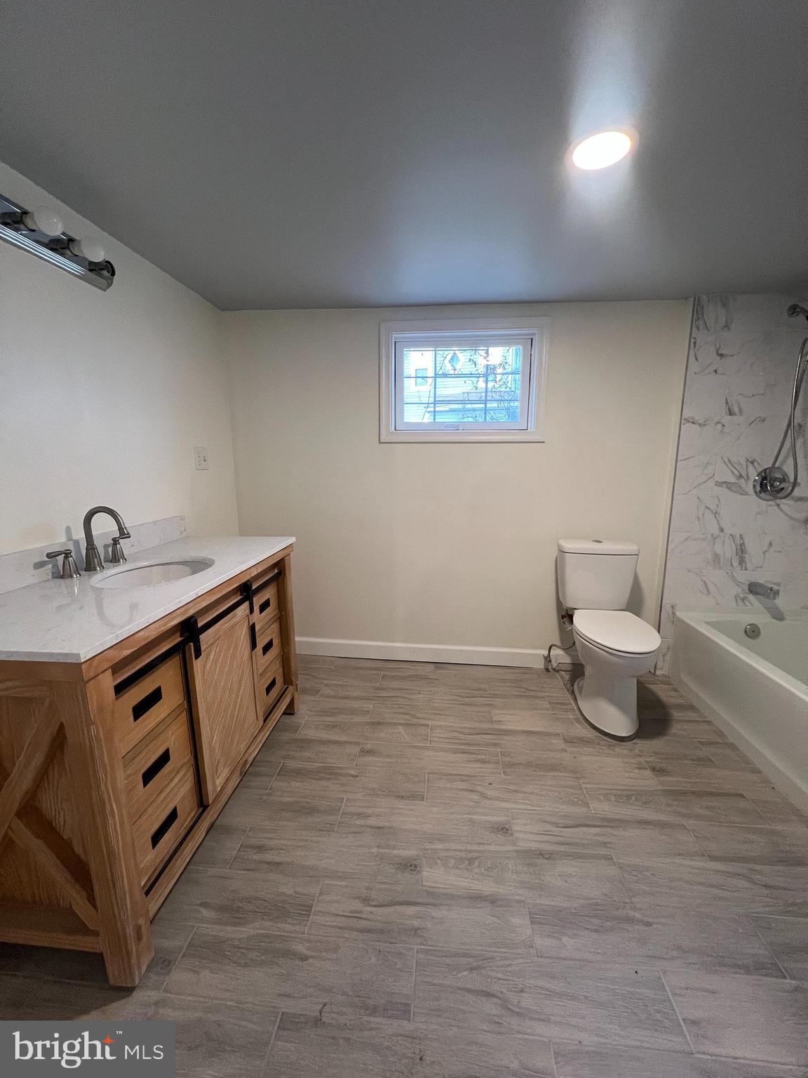 5001 Overton Street Baltimore, MD 21229 - Photo 28 of 32 a room with a sink and a window