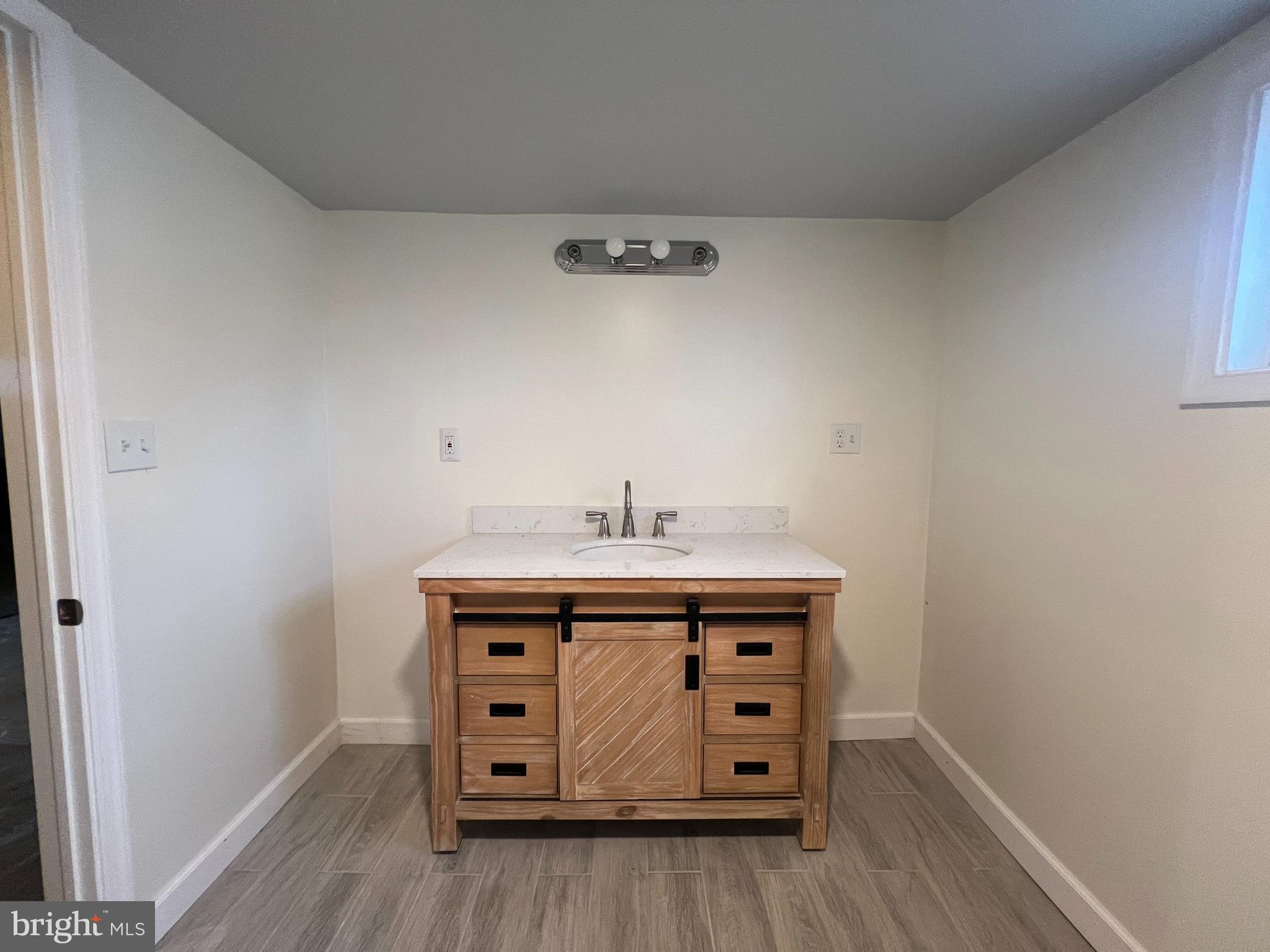 5001 Overton Street Baltimore, MD 21229 - Photo 29 of 32 a utility room with cabinets