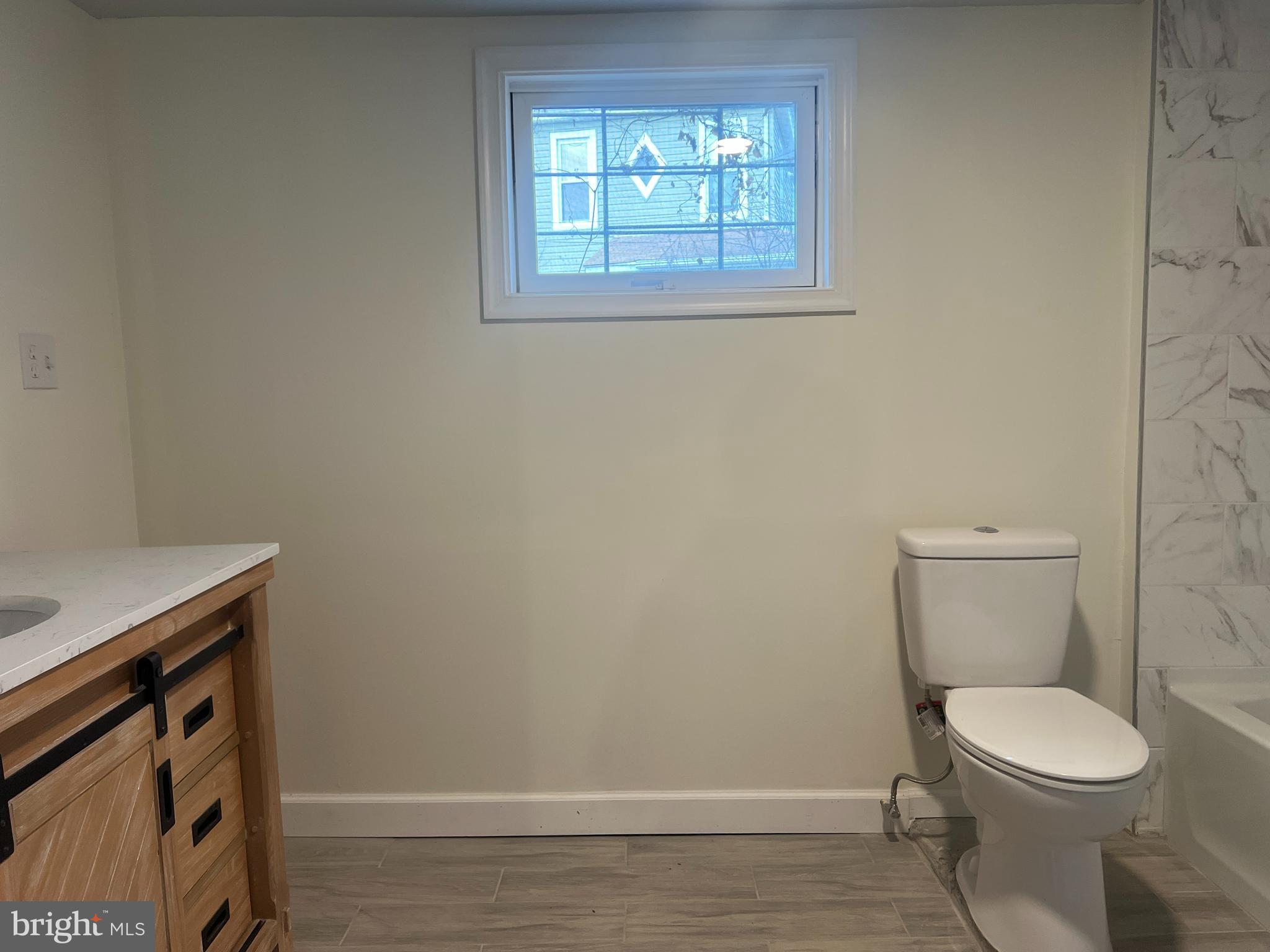5001 Overton Street Baltimore, MD 21229 - Photo 32 of 32 a bathroom with a toilet