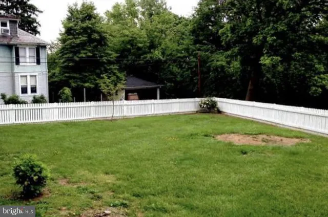 a view of an outdoor space and a yard