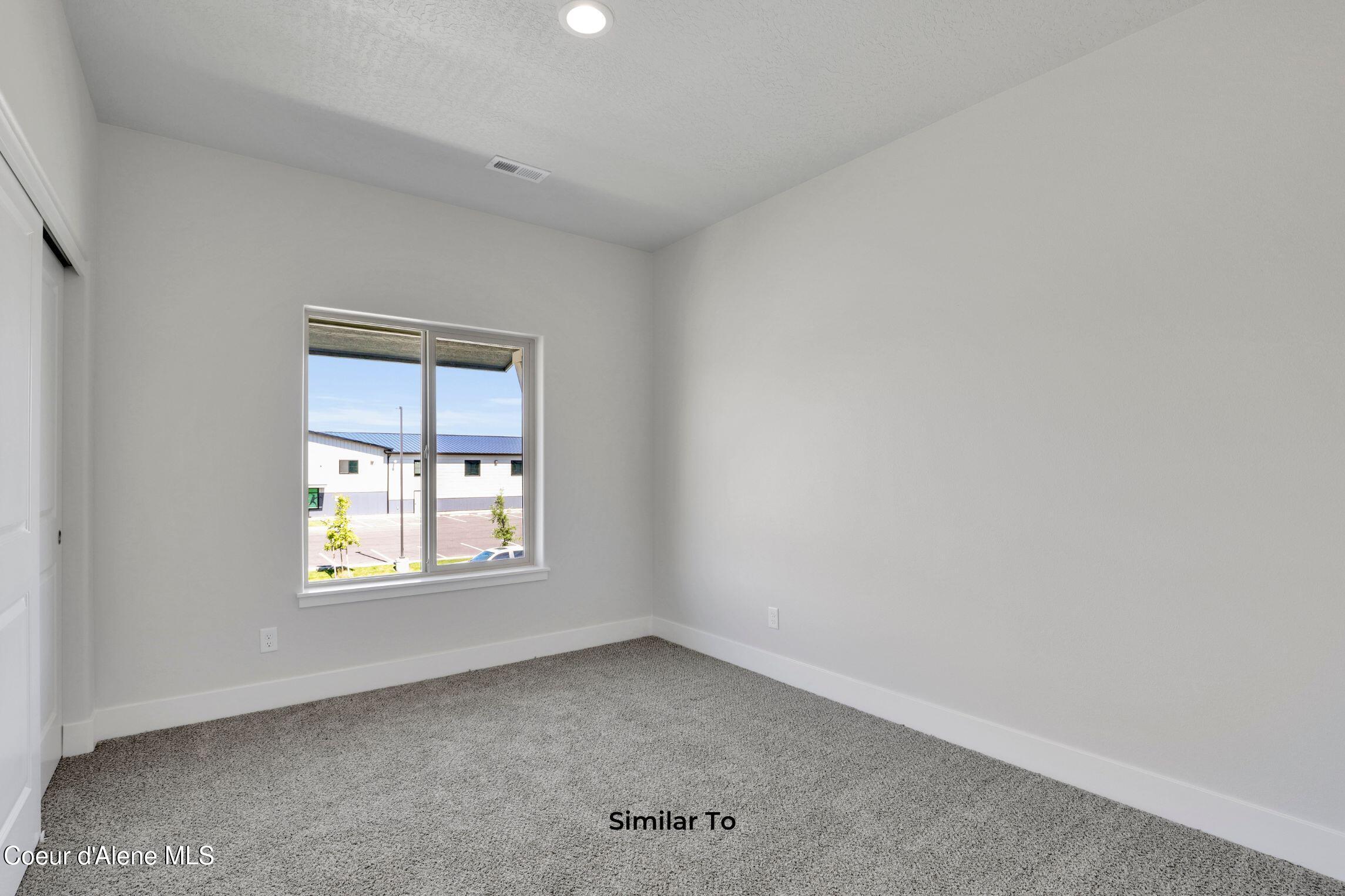 771 North Galbraith Loop Post Falls, ID 83854 - Photo 11 of 16 Secondary Bedroom