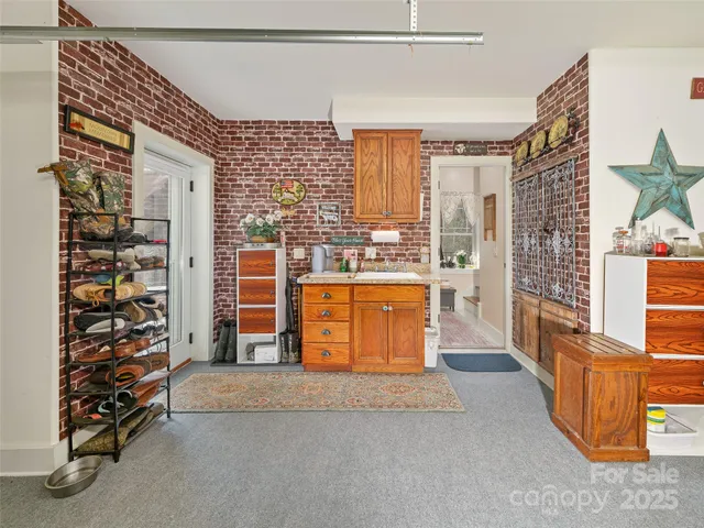 a view of a kitchen with furniture and a window