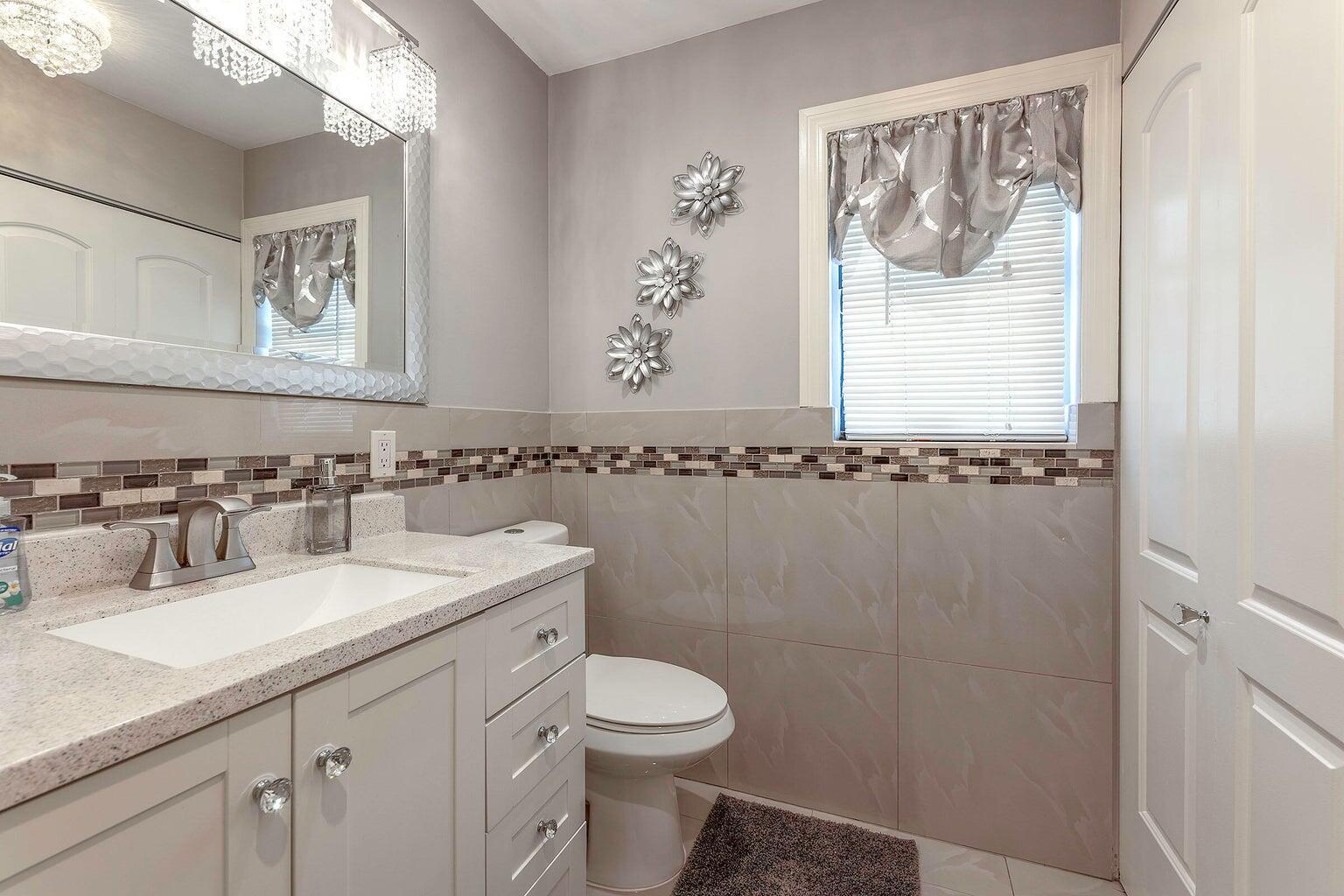 2935 Lake Worth Road Palm Springs, FL 33461 - Photo 18 of 22 half bathroom