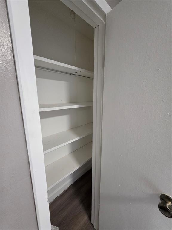 2811 Southwest Archer Road, Unit R142 Gainesville, FL 32608 - Photo 15 of 30 a view of walk in closet with empty racks