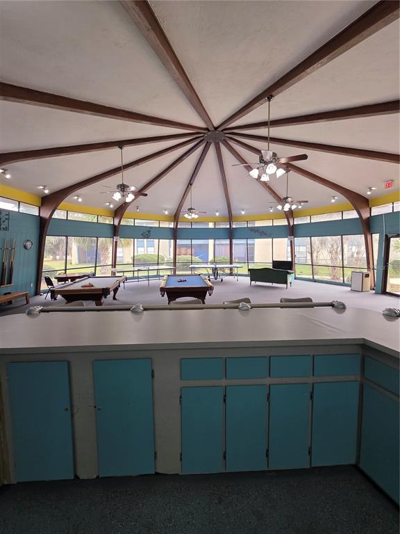 2811 Southwest Archer Road, Unit R142 Gainesville, FL 32608 - Photo 25 of 30 a kitchen with a sink and cabinets