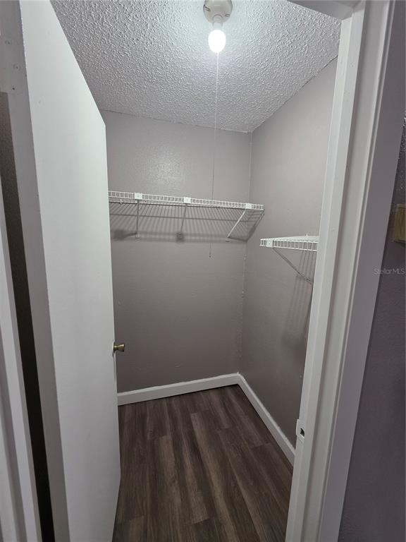 2811 Southwest Archer Road, Unit R142 Gainesville, FL 32608 - Photo 4 of 30 a view of small space with racks on the wall