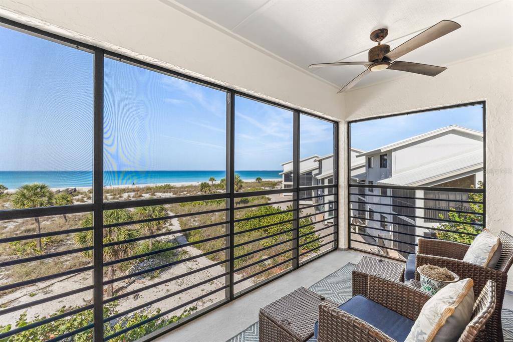 5000 Gasparilla Road, Unit BC306 Boca Grande, FL 33921 - Photo 14 of 35 a view of a balcony with chairs