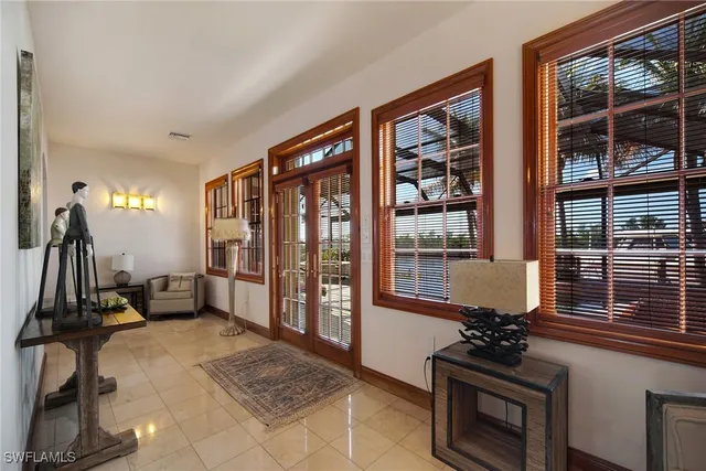 an aerial view of a house with a ocean view