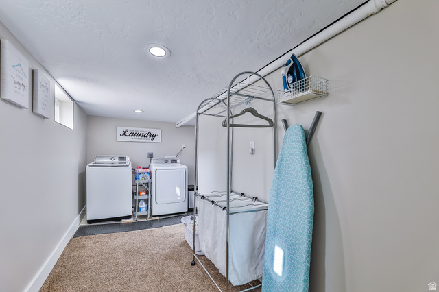 59 East 8680th Street South Sandy, UT 84070 - Photo 23 of 33 Dedicated laundry space featuring a window, recessed lighting, and a neutral color palette