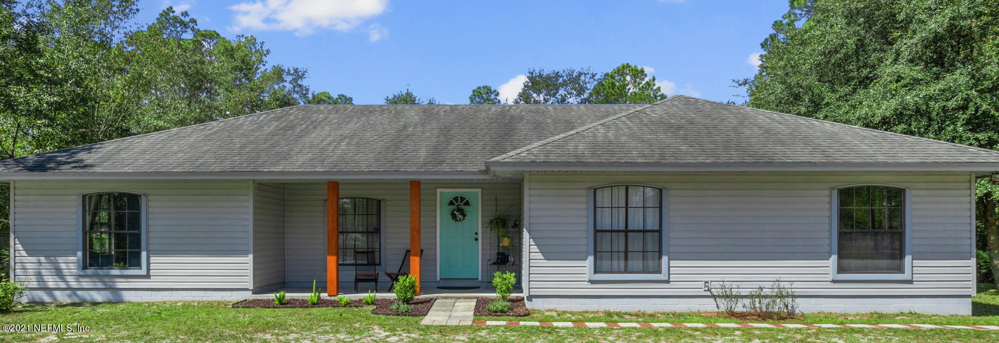 a view of house with street