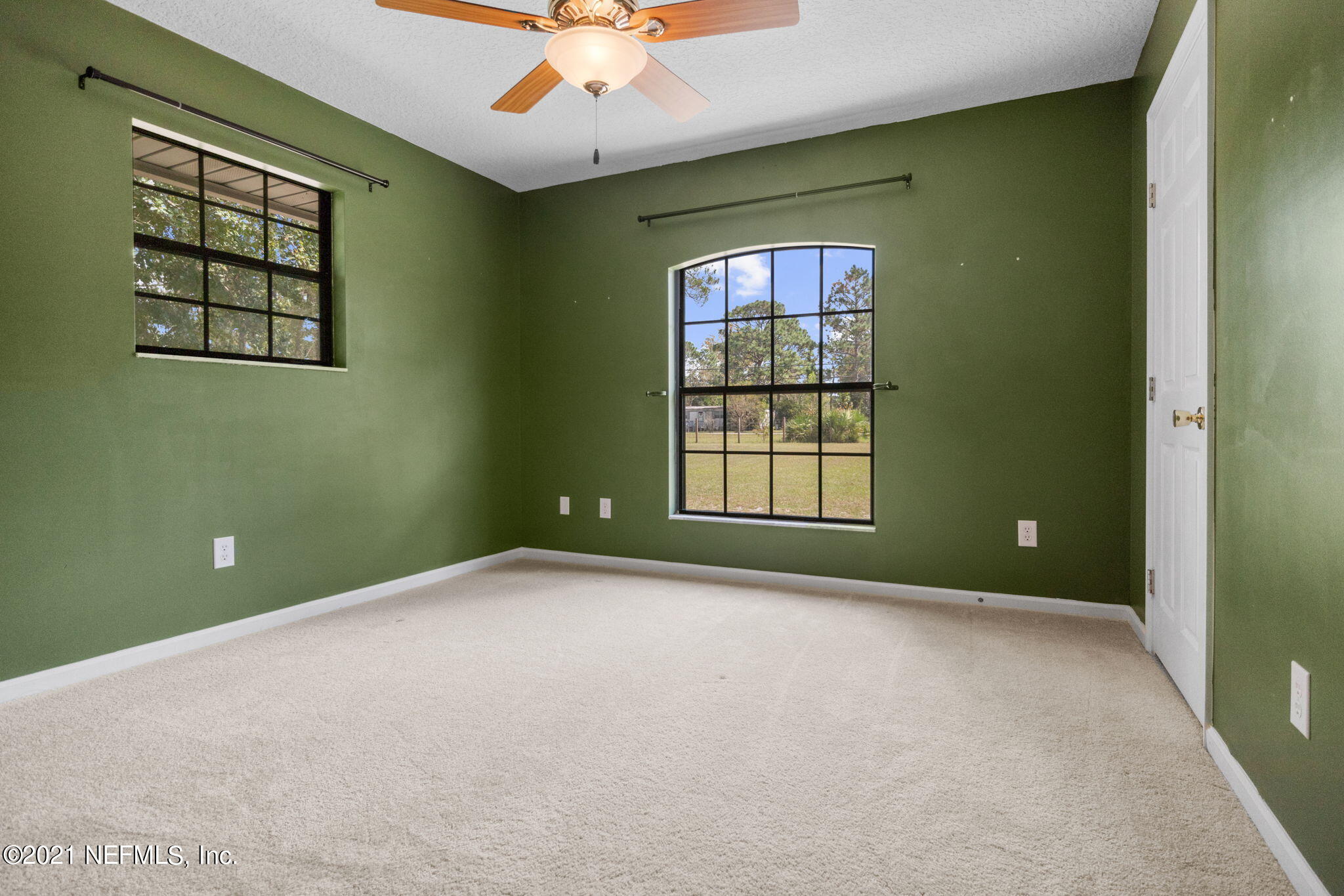 736 Halsema Road North Jacksonville, FL 32220 - Photo 21 of 29 an empty room with windows