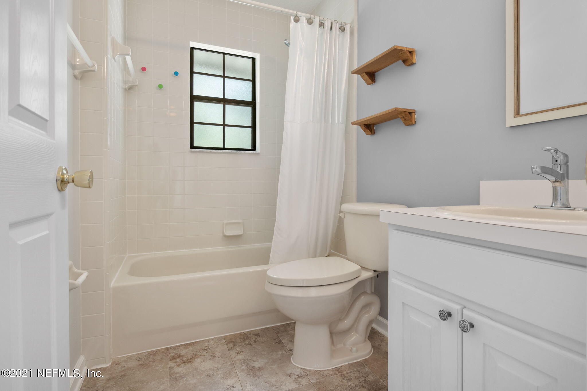 736 Halsema Road North Jacksonville, FL 32220 - Photo 24 of 29 a bathroom with a sink toilet and shower