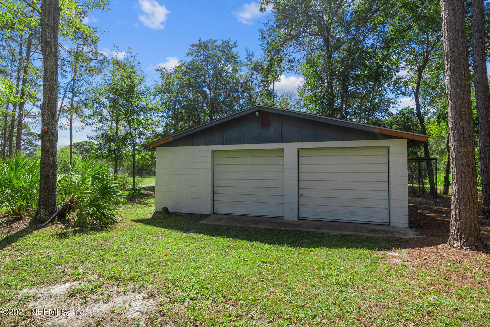 736 Halsema Road North Jacksonville, FL 32220 - Photo 26 of 29 front view of a house with a yard