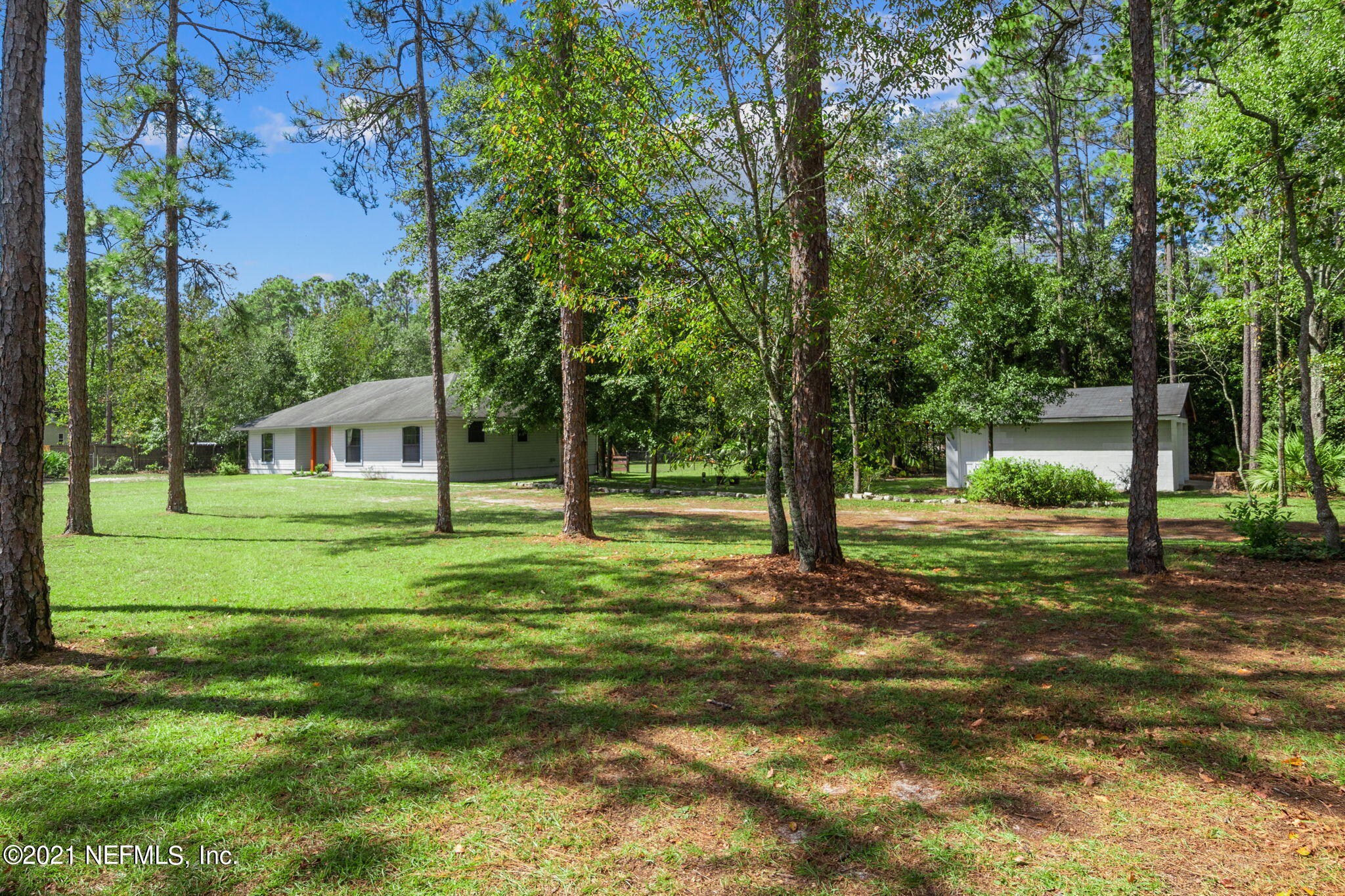 736 Halsema Road North Jacksonville, FL 32220 - Photo 3 of 29 a view of a house with a yard