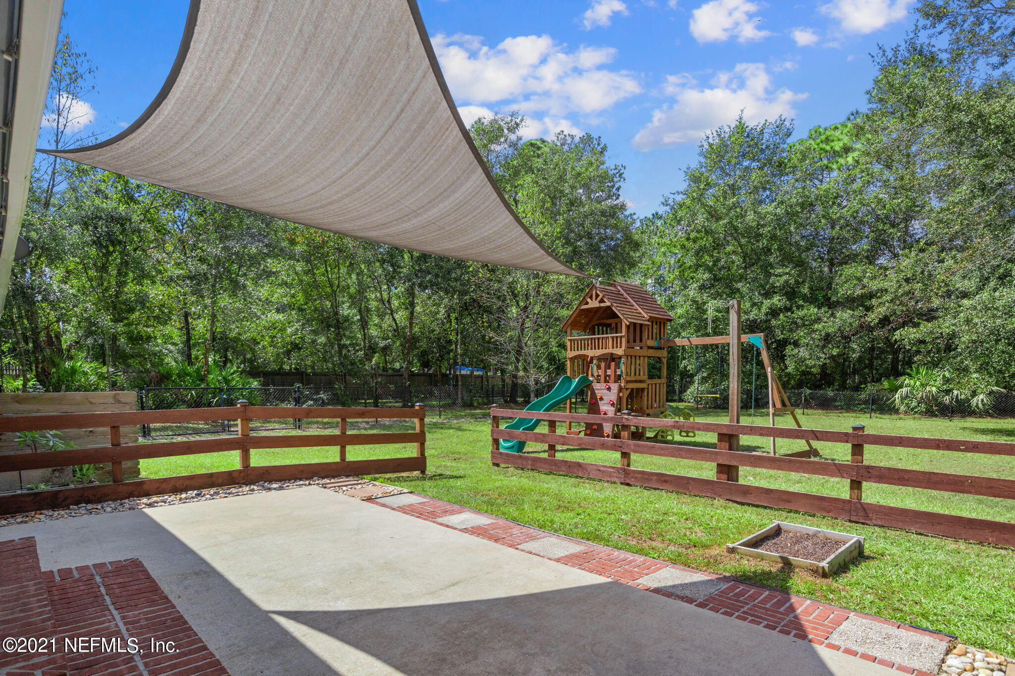 736 Halsema Road North Jacksonville, FL 32220 - Photo 4 of 29 a view of a park with swings