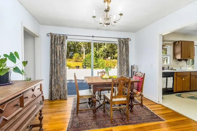 a outdoor dining space with furniture and window