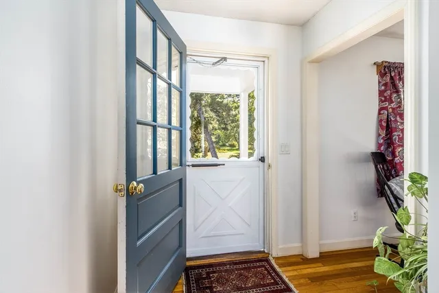 a kitchen with a sink stainless steel appliances a sink and a refrigerator