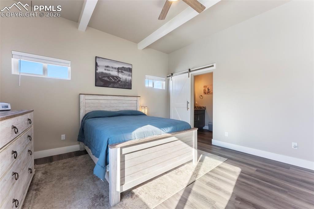 489 Due S Road Florissant, CO 80816 - Photo 15 of 41 a bedroom with a bed and a window