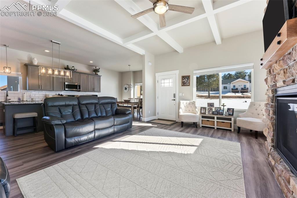 489 Due S Road Florissant, CO 80816 - Photo 4 of 41 a living room with furniture and a fireplace