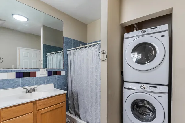a utility room with dryer and washer