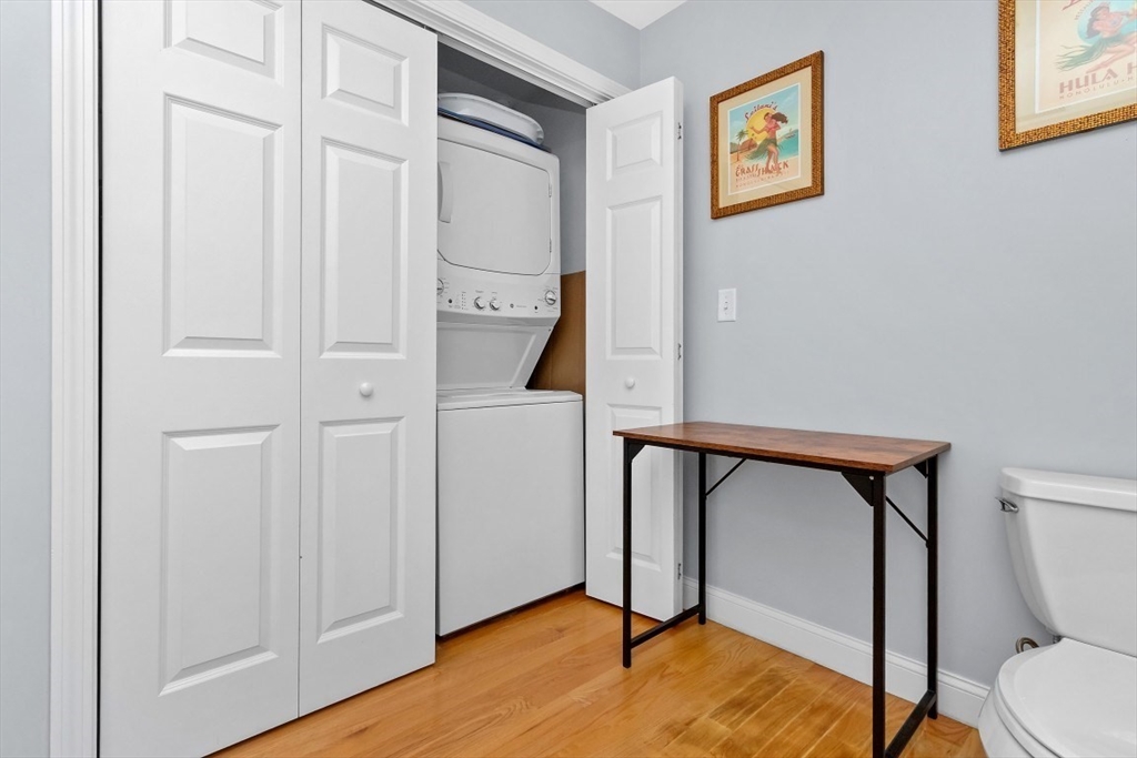 29 Spruce Street, Unit 23 Waltham, MA 02453 - Photo 19 of 26 a view of an entryway with wooden floor