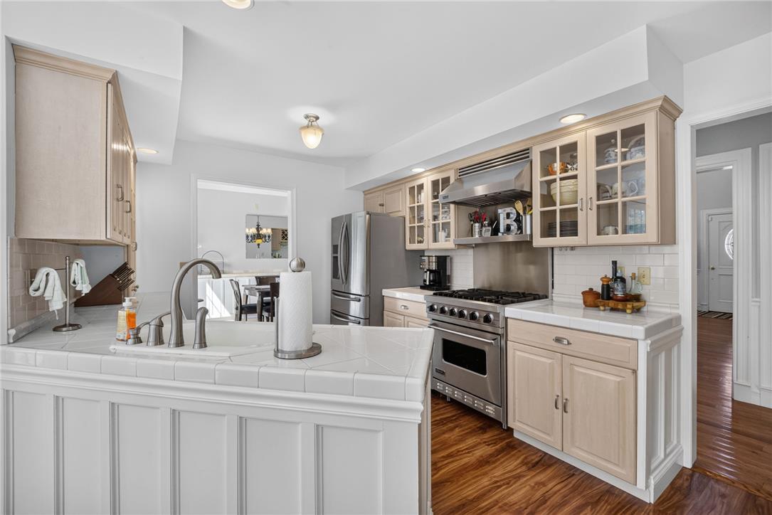 6467 Abbey Road Wind Gap, PA 18091 - Photo 13 of 46 Culinary delights await in this bright kitchen, complete with modern appliances and ample counter space.