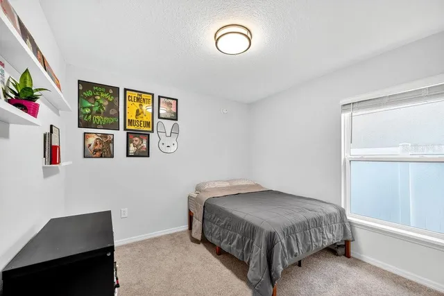 a view of a storage and utility room with a sink