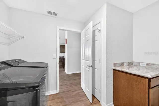 a view of front door and yard