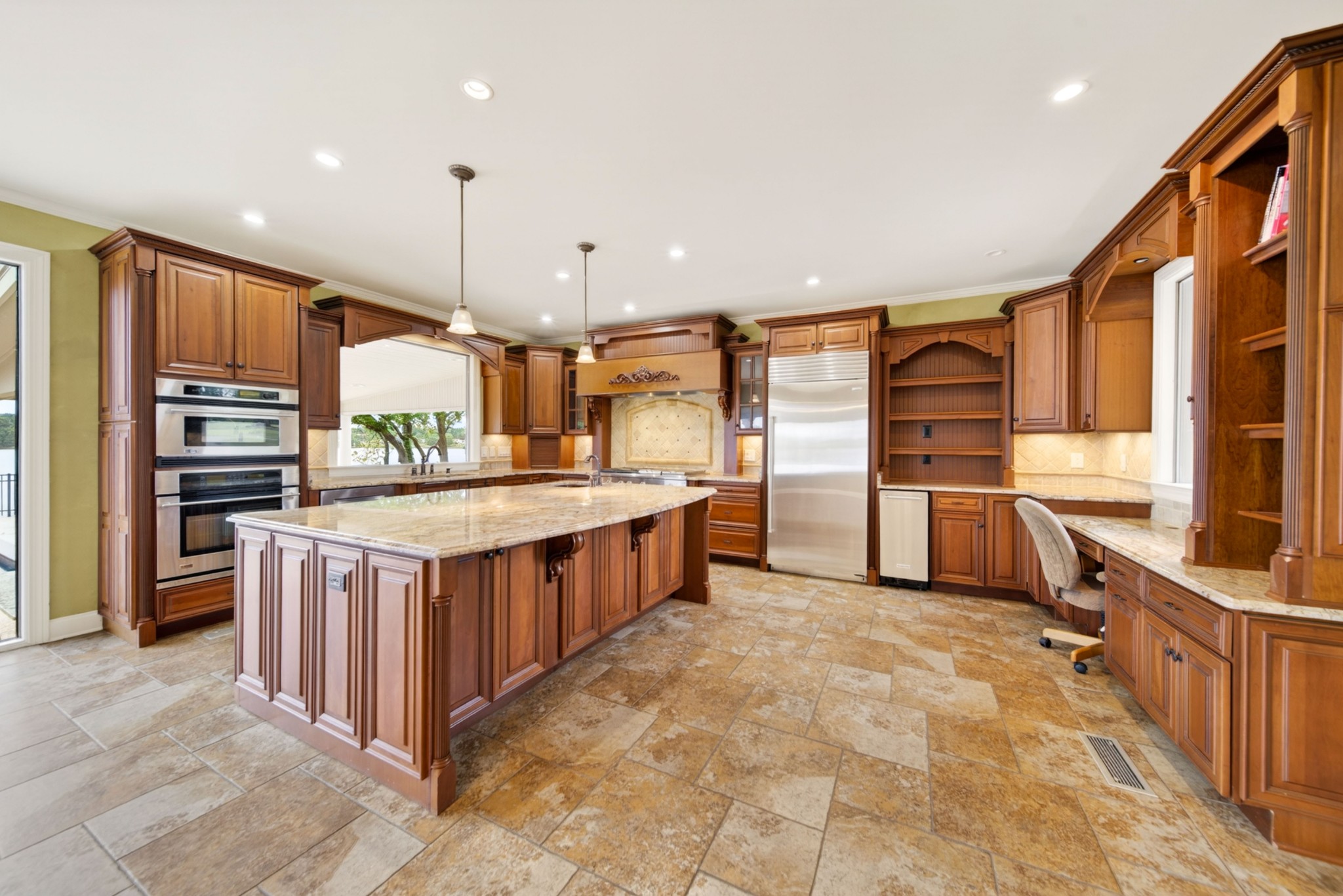 101 Kennett Road Old Hickory, TN 37138 - Photo 41 of 100 a kitchen with stainless steel appliances a stove a sink and a refrigerator
