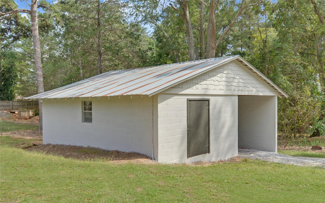 398 Hidden Point Road Hartwell, GA 30643 - Photo 30 of 46 This building offers convenient shelter for vehicles and equipment.