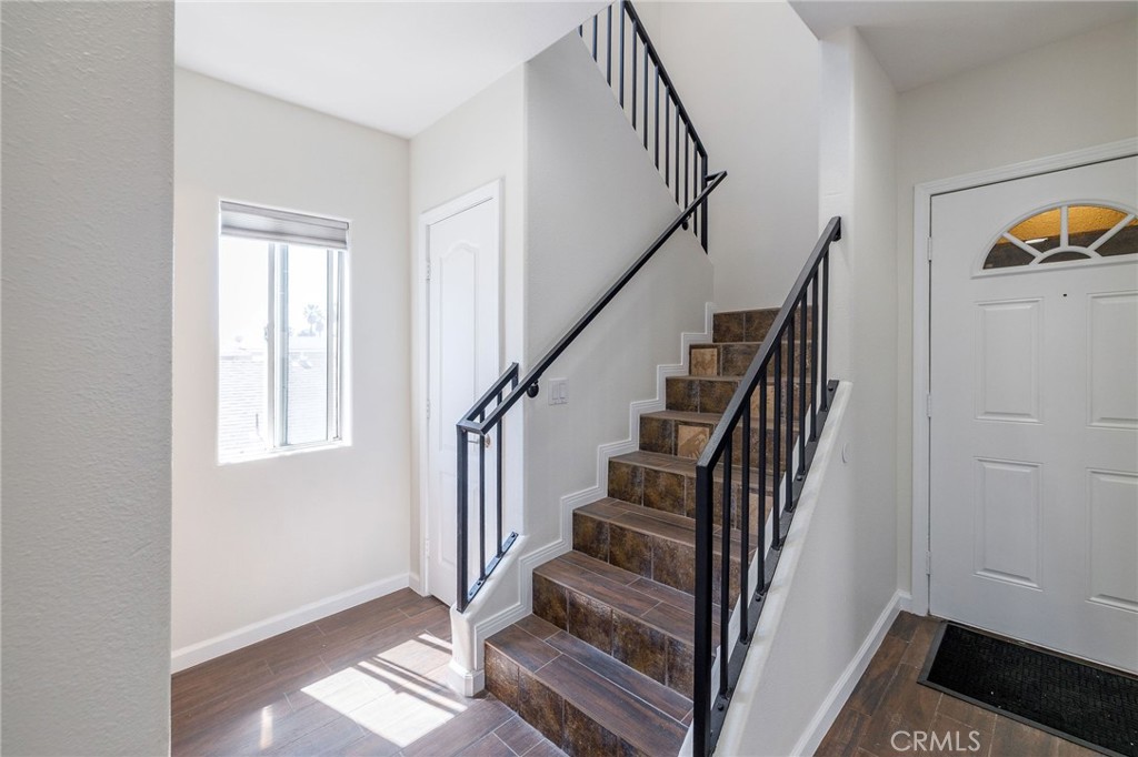 1128 Pacific Avenue Long Beach, CA 90813 - Photo 16 of 33 a view of entryway and hall with wooden floor