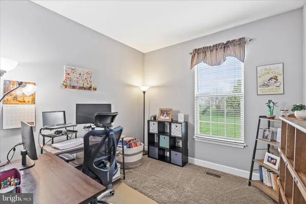 a view of a workspace with a window and workspace