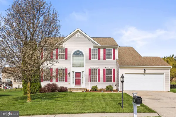 front view of house with a yard