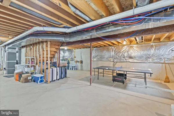 a view of a studio with wooden floor